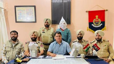 The relative of the man accused of hurting religious sentiments in police custody in Ludhiana on Monday. (HT Photo)