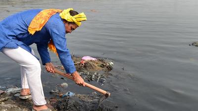 BJP MP Parvesh Verma at a cleanliness drive on the banks of the Yamuna river in New Delhi on Monday. (PTI) BJP MP Parvesh Verma at a cleanliness drive on the banks of the Yamuna river in New Delhi on Monday. (PTI)