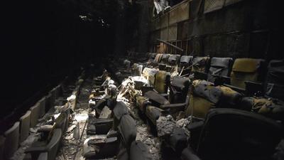 Inside the ruins of Uphaar Cinema on the 20th anniversary of the fire tragedy that occurred on June 13, 1997. The cinema hall resembles a ghost-town, littered with shoes, bottles, fire-blackened seats, vehicles and debris from 20 years ago, in New Delhi in 2017. (HT Archive) Inside the ruins of Uphaar Cinema on the 20th anniversary of the fire tragedy that occurred on June 13, 1997. The cinema hall resembles a ghost-town, littered with shoes, bottles, fire-blackened seats, vehicles and debris from 20 years ago, in New Delhi in 2017. (HT Archive)