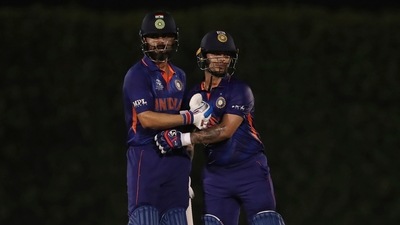 India's captain Virat Kohli, left, congratulates teammate Ishan Kishan on scoring fifty runs during the Cricket Twenty20 World Cup warm-up match between India and England in Dubai, UAE, Monday, Oct. 18, 2021. (AP) India's captain Virat Kohli, left, congratulates teammate Ishan Kishan on scoring fifty runs during the Cricket Twenty20 World Cup warm-up match between India and England in Dubai, UAE, Monday, Oct. 18, 2021. (AP)