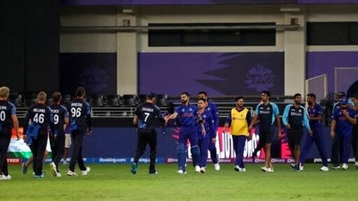 India's captain Virat Kohli leads team members out into the field after winning the Cricket Twenty20 World Cup match between India and Namibia in Dubai, UAE, Monday, Nov. 8, 2021. (AP Photo/Aijaz Rahi) (AP) India's captain Virat Kohli leads team members out into the field after winning the Cricket Twenty20 World Cup match between India and Namibia in Dubai, UAE, Monday, Nov. 8, 2021. (AP Photo/Aijaz Rahi) (AP)