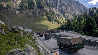 Indian army convoy moves on the Srinagar- Ladakh highway at Gagangeer, northeast of Srinagar, Jammu and Kashmir. (AP Photo/File)