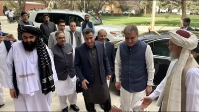 Foreign hand in Kabul: Pakistan foreign minister Shah Mehmood Qureshi with pro-Haqqani outgoing DG ISI Lt Gen Faiz Hameed in Kabul on October 21. Foreign hand in Kabul: Pakistan foreign minister Shah Mehmood Qureshi with pro-Haqqani outgoing DG ISI Lt Gen Faiz Hameed in Kabul on October 21.