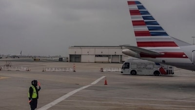 An American Airlines worker seen at the Los Angeles international airport. (REUTERS File)