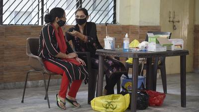 On Monday, 14,208 people were given the Covid-19 vaccines in the district, with 3,703 people being administered the first dose and 10,505 being given the second dose of the vaccines. (Parveen Kumar/HT Photo) On Monday, 14,208 people were given the Covid-19 vaccines in the district, with 3,703 people being administered the first dose and 10,505 being given the second dose of the vaccines. (Parveen Kumar/HT Photo)