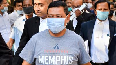 Former Assam CM Hiteswar Saikia's son Ashok Saikia being produced before a court for an alleged bank loan default case, in Guwahati on Monday. (PTI) Former Assam CM Hiteswar Saikia's son Ashok Saikia being produced before a court for an alleged bank loan default case, in Guwahati on Monday. (PTI)