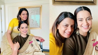 Kangana Ranaut's sister Rangoli Chandel shared pictures with the actor on Instagram and wrote, “How lucky I am to say this Feeling so proud and happy even words falling short to explain !! May Maa Ambika keep showering her blessings on you.” Kangana Ranaut's sister Rangoli Chandel shared pictures with the actor on Instagram and wrote, “How lucky I am to say this Feeling so proud and happy even words falling short to explain !! May Maa Ambika keep showering her blessings on you.” 