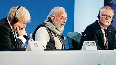 (L-R) Britain's Prime Minister Boris Johnson, India's Prime Minister Narendra Modi, Australia's Prime Minister Scott Morrison at a session on the second day of the COP26 UN Climate Summit in Glasgow. (AFP Photo) (L-R) Britain's Prime Minister Boris Johnson, India's Prime Minister Narendra Modi, Australia's Prime Minister Scott Morrison at a session on the second day of the COP26 UN Climate Summit in Glasgow. (AFP Photo)