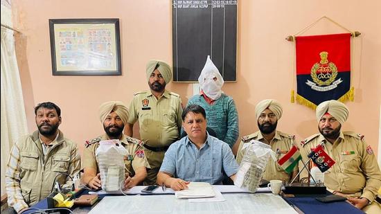 The relative of the man accused of hurting religious sentiments in police custody in Ludhiana on Monday. (HT Photo)
