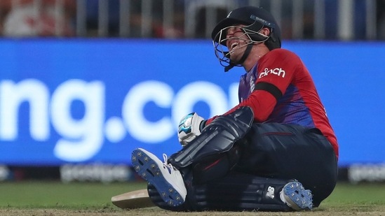 England's Jason Roy reacts in pain after an injury during the Cricket Twenty20 World Cup match between England and South Africa in Sharjah, UAE, Saturday, Nov. 6, 2021. (AP)