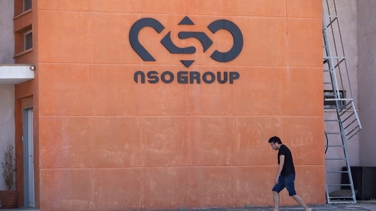 A logo adorns a wall on a branch of the Israeli NSO Group company, near the southern Israeli town of Sapir, (AP Photo/Sebastian Scheiner)