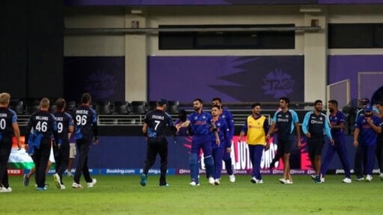 India's captain Virat Kohli leads team members out into the field after winning the Cricket Twenty20 World Cup match between India and Namibia in Dubai, UAE, Monday, Nov. 8, 2021. (AP Photo/Aijaz Rahi)(AP)
