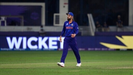 India's captain Virat Kohli runs in to celebrate the dismissal of Scotland's George Munsey during the Cricket Twenty20 World Cup match between India and Scotland in Dubai, UAE, Friday, Nov. 5, 2021. (AP)