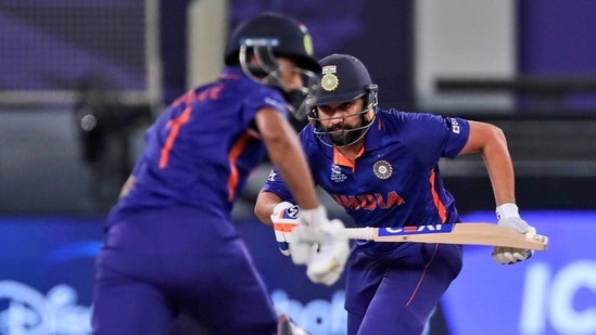 India's Rohit Sharma, right, and KL Rahul run between the wickets during the Cricket Twenty20 World Cup match between India and Namibia in Dubai, UAE, Monday, Nov. 8, 2021. (AP Photo/Aijaz Rahi)(AP)