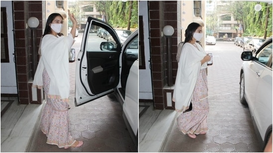 Sara rounded off her ensemble with matching gharara pants. They came in the same floral pattern and featured a fit-and-flare silhouette and crochet piping. She wore the suit set with embroidered pink juttis and a white face mask.(HT Photo/Varinder Chawla)