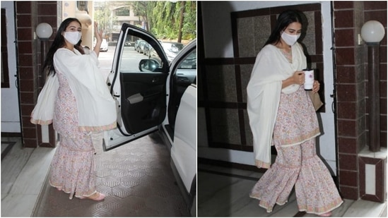 On Monday, Sara was snapped by the paparazzi leaving for an outing in the bay. The actor wore a simple white floral printed gharara set. Sara happily posed for the cameras before getting inside her car.(HT Photo/Varinder Chawla)