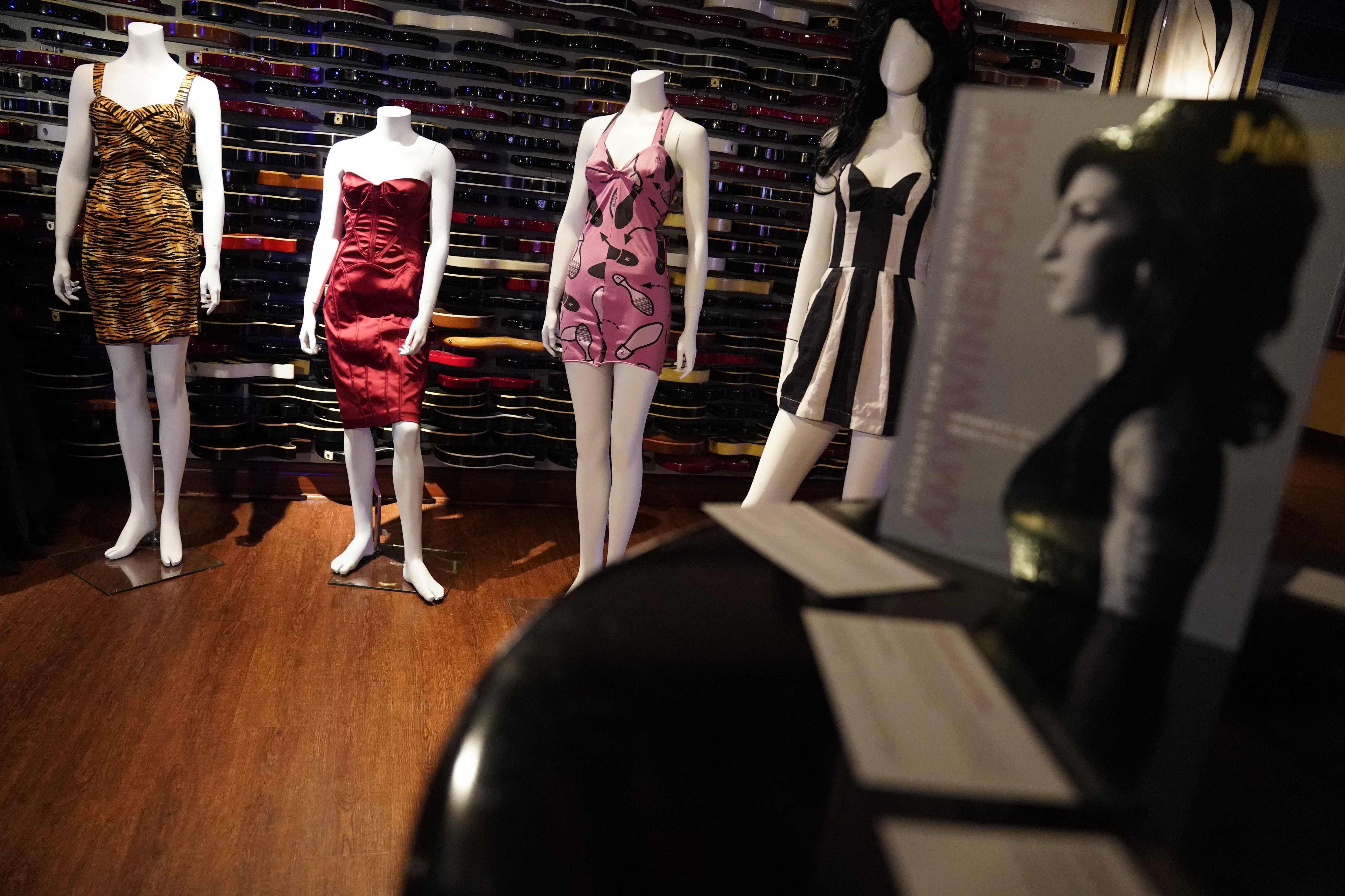 Dozens of dresses, including the famous one Amy Winehouse wore during her dramatic last concert in 2011 (AFP) Dozens of dresses, including the famous one Amy Winehouse wore during her dramatic last concert in 2011 (AFP)