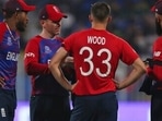 England's captain Eoin Morgan interacts with bowlers Chris Jordan, left, Mark Wood and Moeen Ali, right, during the Cricket Twenty20 World Cup match between England and South Africa in Sharjah, UAE, Saturday, Nov. 6, 2021.(AP) England's captain Eoin Morgan interacts with bowlers Chris Jordan, left, Mark Wood and Moeen Ali, right, during the Cricket Twenty20 World Cup match between England and South Africa in Sharjah, UAE, Saturday, Nov. 6, 2021.(AP)