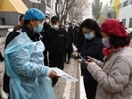 People scanning a QR code to register before getting a Covid-19 coronavirus test in Beijing.(AFP) People scanning a QR code to register before getting a Covid-19 coronavirus test in Beijing.(AFP)