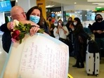 People who have been away from their loved ones for more than a year and a half, finally reunited and exchanged hugs and kisses after the United States finally lifted travel restrictions. In this photo, people applaud and take pictures as a women greets her boyfriend after he arrived from France at Newark Liberty International Airport in Newark. (AP) People who have been away from their loved ones for more than a year and a half, finally reunited and exchanged hugs and kisses after the United States finally lifted travel restrictions. In this photo, people applaud and take pictures as a women greets her boyfriend after he arrived from France at Newark Liberty International Airport in Newark. (AP)