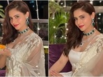 Brides-to-be take notes, we have found the perfect ensemble for your wedding trousseau, and it comes straight from Aamna Sharif's breathtaking traditional wardrobe. The star recently celebrated the festive season with her friends at home. She slipped into a bespoke white lehenga set for the occasion and made our jaws hit the floor.(Instagram/@aamnasharifofficial) Brides-to-be take notes, we have found the perfect ensemble for your wedding trousseau, and it comes straight from Aamna Sharif's breathtaking traditional wardrobe. The star recently celebrated the festive season with her friends at home. She slipped into a bespoke white lehenga set for the occasion and made our jaws hit the floor.(Instagram/@aamnasharifofficial)