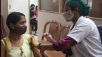 A person taks a Covid-19 vaccine jab in Mumbai. A majority of Covid-19 cases in Maharashtra were reported in urban areas. (HT photo) A person taks a Covid-19 vaccine jab in Mumbai. A majority of Covid-19 cases in Maharashtra were reported in urban areas. (HT photo)