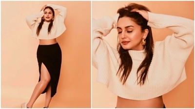 Huma Qureshi is all ready for winters as she poses in an off-white crop sweater and high rise thigh-high slit black skirt. (Instagram/@iamhumaq) Huma Qureshi is all ready for winters as she poses in an off-white crop sweater and high rise thigh-high slit black skirt. (Instagram/@iamhumaq)