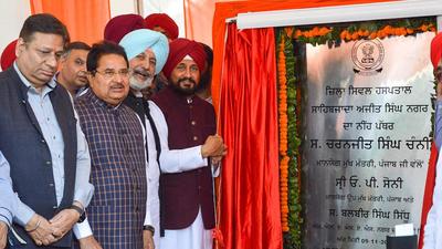 Punjab chief minister Charanjit Singh Channi and former health minister Balbir Singh Sidhu lays the foundation stone of a Government Hospital at Sector-66, Sahibzada Ajit Singh Nagar on Tuesday. (Gurtej Singh/HT)