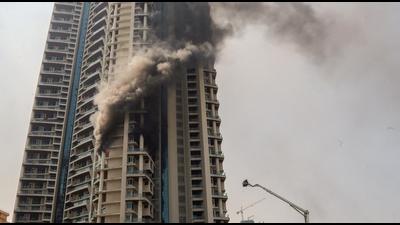 On October 22, a level four fire was reported in Avighna Park, a 60 storey building, in which dozens of citizens were rescued safely. However, a 30-year-old security guard lost his life. In its preliminary report submitted by the Mumbai Fire Brigade (MFB) on Tuesday, into level four fire at Avighna Park in Currey Road, the officials have stated that the primary cause of the fire was a short circuit in the main switchboard. (HT PHOTO)