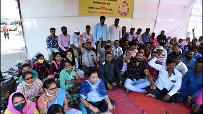 The indefinite protest by workers of the Maharashtra State Road Transport Corporation (MSRTC) across the state and in Pune continued on Tuesday. (HT PHOTO) The indefinite protest by workers of the Maharashtra State Road Transport Corporation (MSRTC) across the state and in Pune continued on Tuesday. (HT PHOTO)