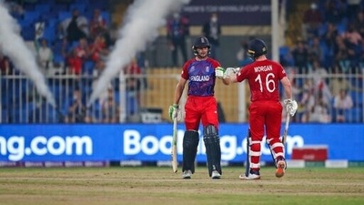 England's Jos Buttler and captain Eoin Morgan celebrate after a six hit by Buttler during the Cricket Twenty20 World Cup match between England and Sri Lanka in Sharjah, UAE, Monday, Nov. 1, 2021. (AP) England's Jos Buttler and captain Eoin Morgan celebrate after a six hit by Buttler during the Cricket Twenty20 World Cup match between England and Sri Lanka in Sharjah, UAE, Monday, Nov. 1, 2021. (AP)