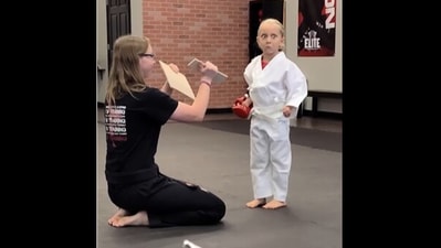 ‘Karate Kid’ girl is surprised after breaking martial art board.&nbsp; (instagram/@deardorans)