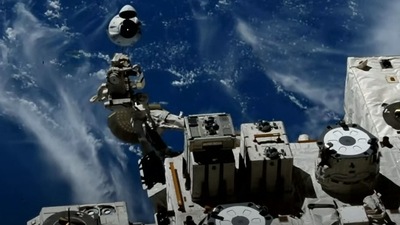 This screengrab taken from the SpaceX live webcast shows a view of the Crew-2 SpaceX Dragon capsule dubbed ‘Endeavour', off the side of the International Space Station, as they return to earth. (AFP)