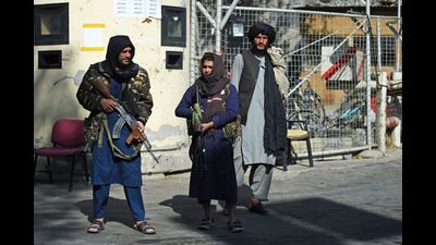 Taliban fighters stand guard at an entrance gate of the Sardar Mohammad Dawood Khan military hospital, Kabul, November 3, 2021 (AFP) Taliban fighters stand guard at an entrance gate of the Sardar Mohammad Dawood Khan military hospital, Kabul, November 3, 2021 (AFP)