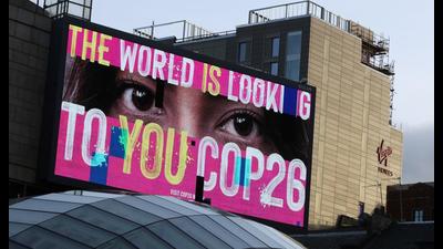 An advertising board is seen during the UN Climate Change Conference (COP26), Glasgow, Scotland, November 7, 2021 (REUTERS) An advertising board is seen during the UN Climate Change Conference (COP26), Glasgow, Scotland, November 7, 2021 (REUTERS)