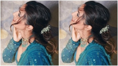 The ensemble is embroidered in silver mirrors and silver resham threads. (Instagram/@realhinakhan)