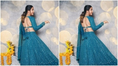 Styled by hair stylist Drishya, Hina opted for a festive look in a messy ponytail. (Instagram/@realhinakhan)