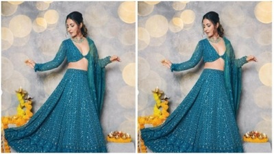 In an indoor setup, adorned in marigold, Hina posed for the pictures. (Instagram/@realhinakhan)