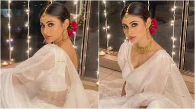 This festive season has made way for the classic white hue in our ethnic wardrobe, ditching the usual roster of bright colours and jewel tones. It means white is going to be the favourite look of the wedding season too. Bollywood's most stylish celebrities have also given the trend a stamp of approval by wearing the classic colour for many events. And Mouni Roy seems to be the latest trend-setter in this list. (Instagram/@imouniroy) This festive season has made way for the classic white hue in our ethnic wardrobe, ditching the usual roster of bright colours and jewel tones. It means white is going to be the favourite look of the wedding season too. Bollywood's most stylish celebrities have also given the trend a stamp of approval by wearing the classic colour for many events. And Mouni Roy seems to be the latest trend-setter in this list. (Instagram/@imouniroy)