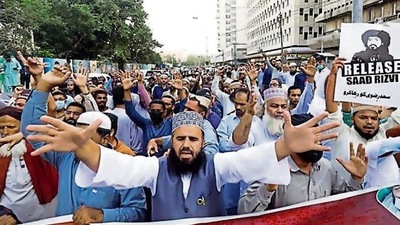 Supporters of the Tehreek-e-Labbaik Pakistan chant slogans demanding the release of their leader last month. (Reuters File) Supporters of the Tehreek-e-Labbaik Pakistan chant slogans demanding the release of their leader last month. (Reuters File)