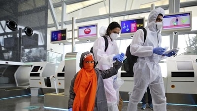 A family at Bengaluru's Kempegowda International Airport (AP/Image used only for representative purpose) A family at Bengaluru's Kempegowda International Airport (AP/Image used only for representative purpose)