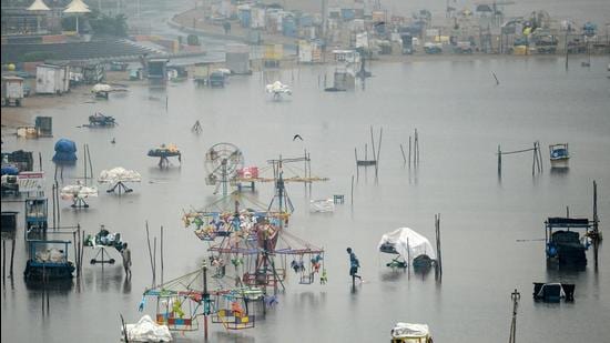 Though there has been a respite from rain on Tuesday, with Chennai registering 11 mm rainfall until 5.30 pm, parts of the city are still inundated from heavy rainfall over the weekend. (AFP)