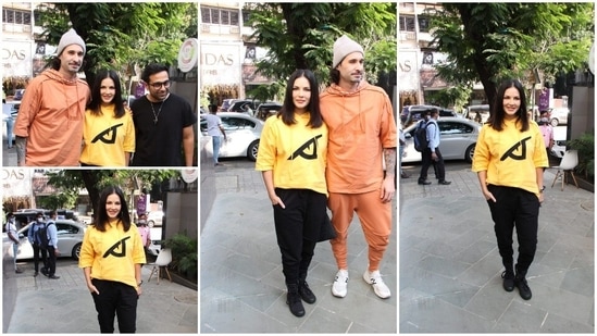 Sunny Leone and Daniel Weber pose for the paparazzi during their outing on November 9.(HT Photo/Varinder Chawla)