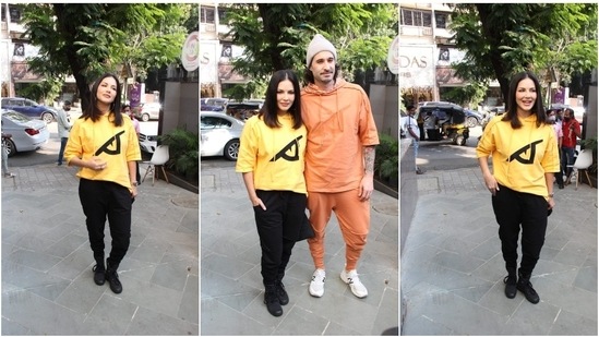 Bollywood celebs love wearing fancy gowns and sarees but streetwear is their go-to outfit. Sunny Leone and Daniel Weber decided to step out in stylish casual wear and grabbed eyeballs.(HT Photo/Varinder Chawla)