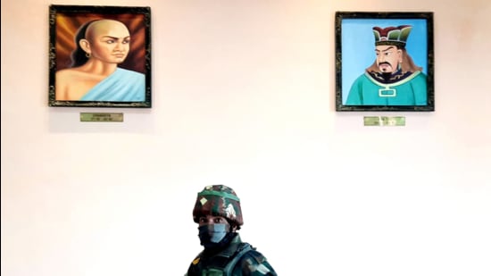 File photo: Portraits of strategists Chanakya and Sun Tzu at the India-China border personnel meeting hut on LAC at Bum La in Arunachal Pradesh. (HT photo/Rahul Singh) File photo: Portraits of strategists Chanakya and Sun Tzu at the India-China border personnel meeting hut on LAC at Bum La in Arunachal Pradesh. (HT photo/Rahul Singh)