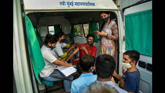People receive vaccine during a special vaccination drive against Covid-19 in Navi Mumbai. (PTI)