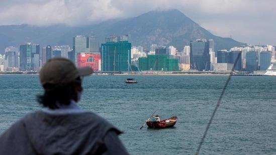 Hong Kong will not open up to global travel until mid-2022&nbsp;(Photo by ISAAC LAWRENCE / AFP)