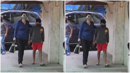Kajol was clicked as she walked out of her Pilates studio with son Yug Devgn.(HT Photos/Varinder Chawla)