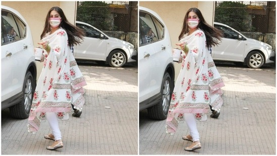 Sara Ali Khan walked out of her Pilates studio in a white salwar suit.(HT Photos/Varinder Chawla)