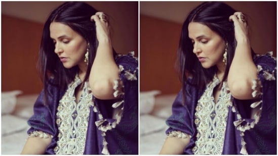 The statement long sleeves steal the limelight with silver resham work.(Instagram/@nehadhupia)